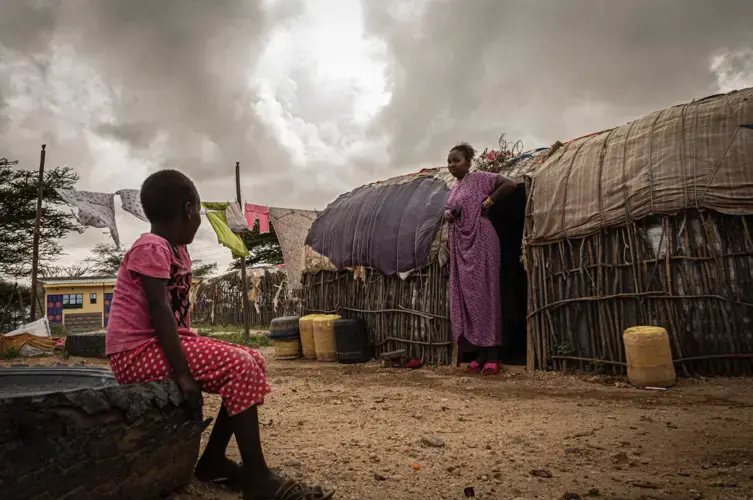 Vicky, 18, with her sister at their family home in Laisamis, Kenya. Image by Will Swanson. Kenya, 2020.