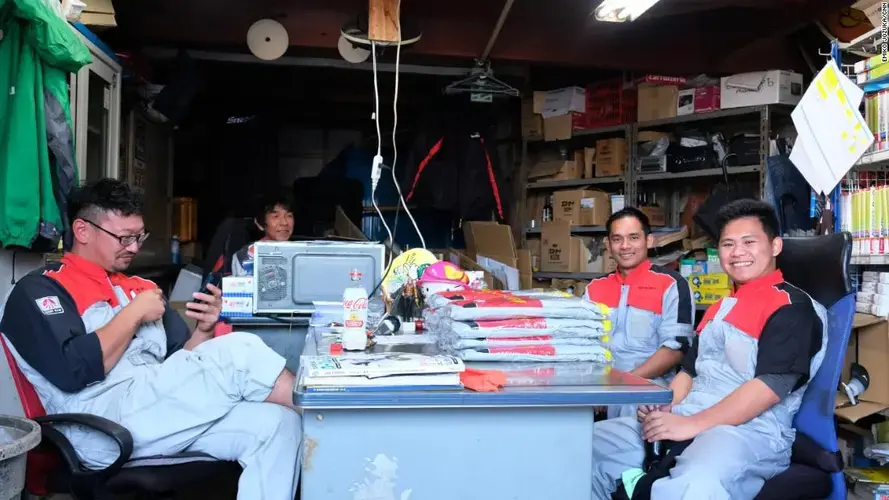 Both local and foreign workers at the car dealership said they hoped the immigrants could stay in Japan. Image by Emiko Jozuka. Japan, 2018.