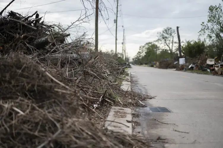 The destruction from back-to-back Hurricanes Laura and Delta remains vast in most neighborhoods of Lake Charles. A global pandemic has helped to slow recovery efforts. Image by Katie Sikora. United States, 2020.