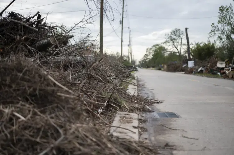 The destruction from back-to-back Hurricanes Laura and Delta remains vast in most neighborhoods of Lake Charles. A global pandemic has helped to slow recovery efforts. Image by Katie Sikora. United States, 2020.