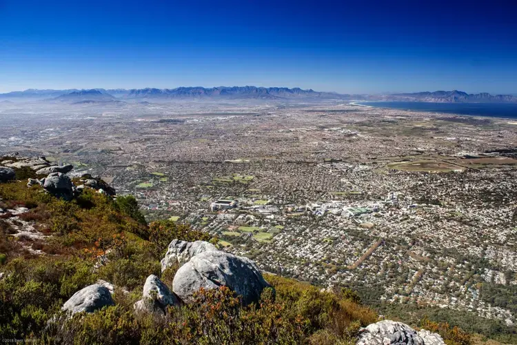 Sprawling east from Table Mountain, the Cape Flats are home to many of the city black and poorer residents. Image by Brett Walton/Circle of Blue. South Africa, 2018.