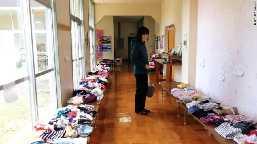 Nobue Sasaki stands in the hallway of the Nagi Child Home. Image by Emiko Jozuka. Japan, 2018.