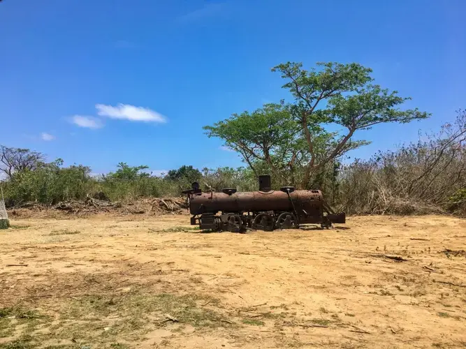 A rusty train left over from Vieques’ former sugar mill, which closed after the military occupied two-thirds of the island in 1942. Image by Martha Bayne. Puerto Rico, 2019.