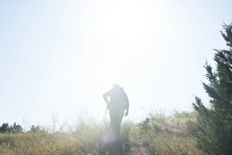 Justin Schaaf, a hunter and conservationist, scouts for elk in the Charles M. Russell National Wildlife Refuge. Image by Claire Harbage / NPR. United States, 2019.