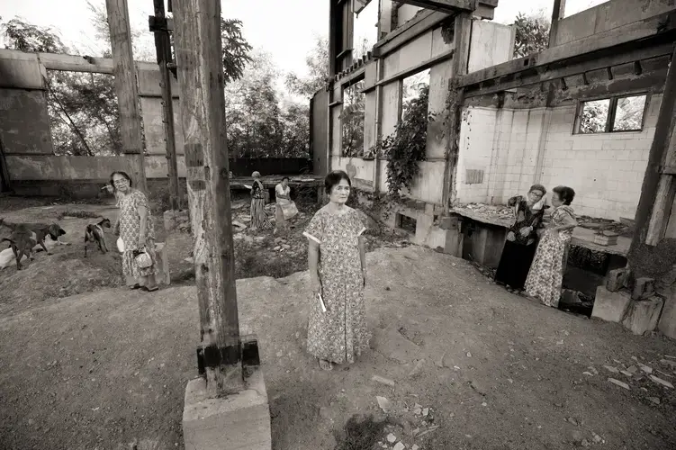'We will not forget what happened until the day we die. It has been engraved in our hearts,' said Francia Aga Buco (center). On Nov. 23, 1944, Buco was one of the girls and women raped in the village of Mapaniqui. Buco, who became a seamstress, was not eligible for Japanese compensation for 'comfort women' because she was not held over an extended period. Image by Cheryl Diaz Meyer. Philippines, 2019.