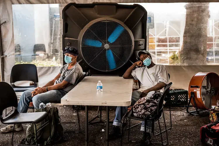 PHOENIX. People at a cooling center during Arizona’s record-setting heat wave. Image by Meridith Kohut. United States, 2020.