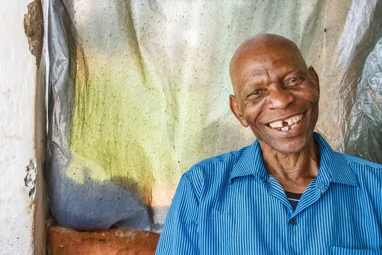 Chief Paulo Douglas of Mulumbe ordered tree-planting in his village – as an investment for his grandchildren. Image by Nathalie Bertrams. Malawi, 2017.