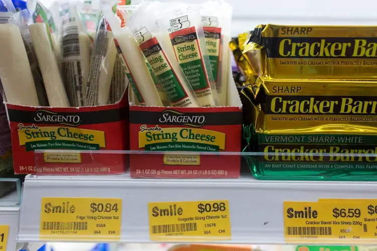 String cheese made by Plymouth, Wisconsin-based Sargento Foods Inc. is sold at a small grocery store central Phnom Penh. Image by Mark Hoffman. Thailand, 2019.