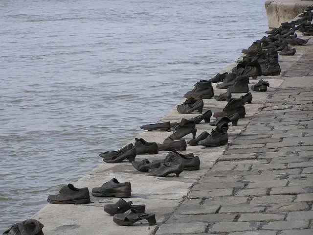The Shoes on the Danube, a Budapest Holocaust memorial marking the mass execution of the city’s Jews on the riverbank. Image by Neil Hooting. Hungary, 2008. (CC BY 2.0).