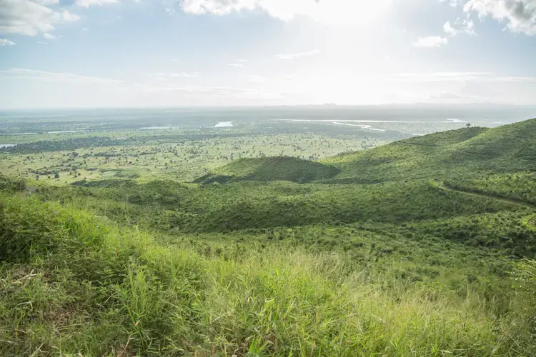 View of Malawi’s Shire valley. The power generated by three hydro power plants in the Shire river has fallen by 66 percent due to Lake Malawi's declining water level, blamed on erratic rains made worse by climate change. Image by Nathalie Bertrams. Malawi, 2017.