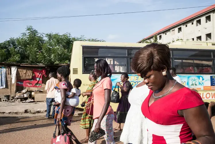 Faithful leaving church after the midday service. Image by Tomaso Claravino. Ghana, 2018.