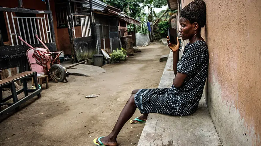 Theresa hasn't spoken to her son Emmanuel for five months after he was accused of witchcraft by his stepfather. Image by Marc Ellison/Al Jazeera. Nigeria, 2018.