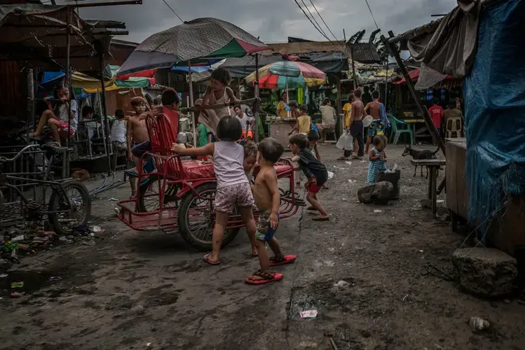 More than a fifth of the population of the Philippines lives below the poverty line. The strict Catholic country also has one of the highest birth rates in Southeast Asia. More than 65% of women don’t use a modern form of contraceptive. In the shanty towns around Manila, poverty is ingrained. Image by James Whitlow Delano. Philippines, 2017.