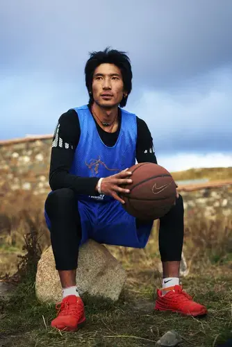 Dugya Bum, who is the best player on the Norlha basketball team. Image by An Rong Xu. Tibet, 2018.
