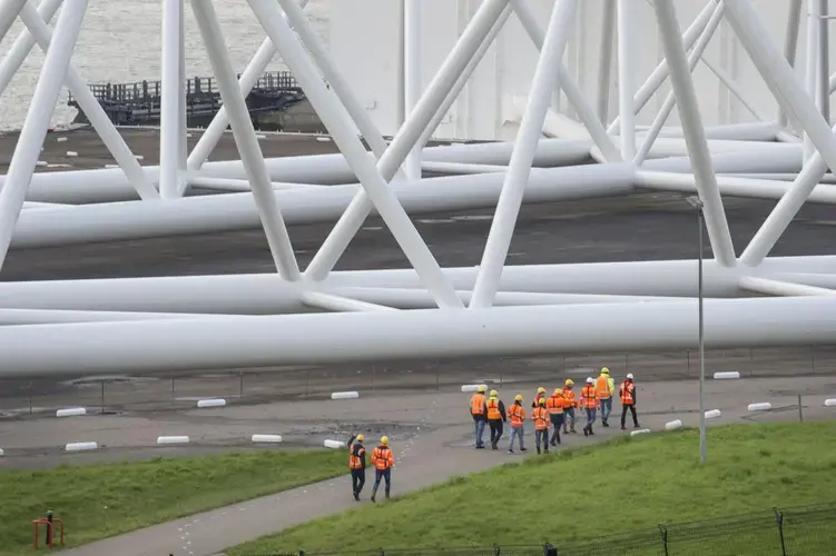 Officials with the Maeslant storm surge barrier on the New Waterway in South Holland, Netherlands. Image by Chris Granger. Netherlands, 2019.