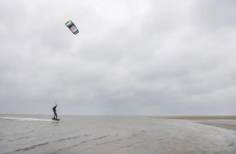 The Zandmotor, or Sand Motor, is popular among kitesurfers as well as traditional surfers. Image by Chris Granger. Netherlands, 2019.