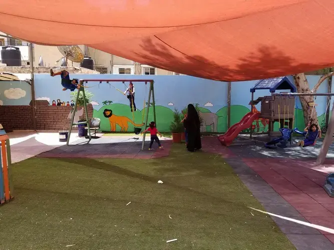 According to Zarqa Life Center, offering a safe space to women—both Syrian and Jordanian—has provided a critical outlet to children as well. Gertrude Khouri, the director at the center, explained to the Pulitzer Center, that they “saw a large number of women who had become heads of households.” Their “husbands were missing or had become victims.” Image by Aman Madan. Jordan, 2017. 