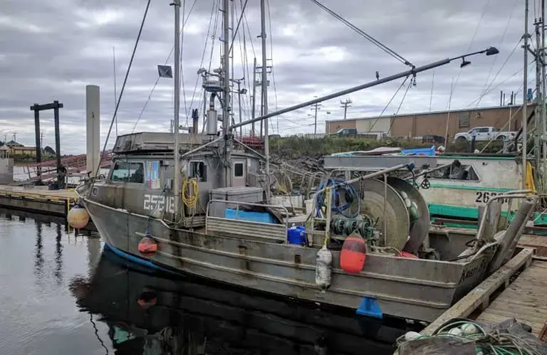 A fishing boat in Lax Kwalaams harbor. With fishing catches down so far, many local fishermen have given up the livelihood. Image by Saul Elbein. Canada, 2017.