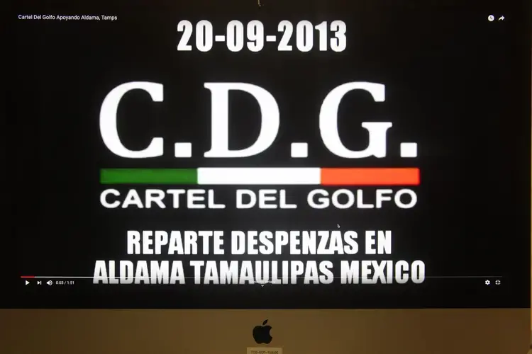 The cartels use YouTube and social media to boast about helping people, like when the Gulf Cartel distributed food and clothing to hurricane victims in 2013. Image by Omar Ornelas. Mexico, 2019.