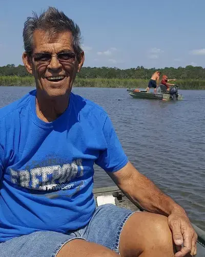 Billy Bailey was an avid fisherman loved by his family. The western North Carolina log home builder died in 2017 after a fishing trip to Edisto Beach, S.C. A dangerous microbe found in the bays and inlets of the Carolinas infected him. Image courtesy of Karan Gordon. United States, undated.