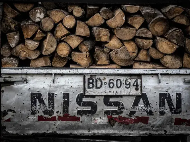 Most of the homes and businesses in Coyhaique are heated with wood in stoves that cause high levels of PM 2.5 — both indoors and outdoors. Image by Larry C. Price. Chile, 2018.