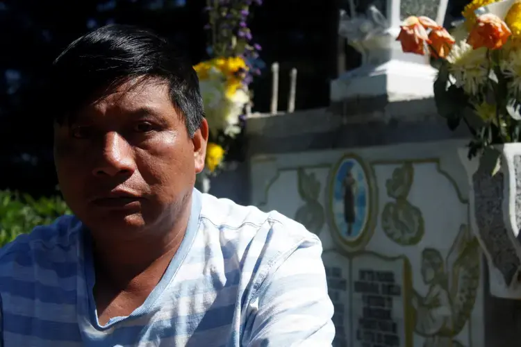 Gilberto Gonzalez visits his daughter’s grave every day. Claudia Gomez-Gonzales, 21, was shot in the head by a U.S. Border Patrol agent in May 2018 near Rio Grande, Texas. Authorities say she crossed into the country illegally and was trying to evade arrest; witnesses say she was hiding in a bush. Her body was repatriated in June and is buried at the edge of a cliff in her hometown of San Juan-Ostuncalco. Image by Kristian Hernandez. Guatemala, 2018.