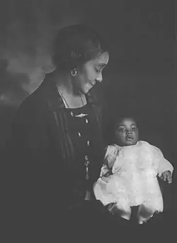Nan Giles Bostic, with her nephew, George Giles, Jr.​, circa 1935;  Originally, this photo was loaned to MGP by Patricia McKinney Lewis who provided the names of the individuals and year — her relatives — and approximate years of the photo for this interview. Image courtesy of Barb Garvey. United States, undated.