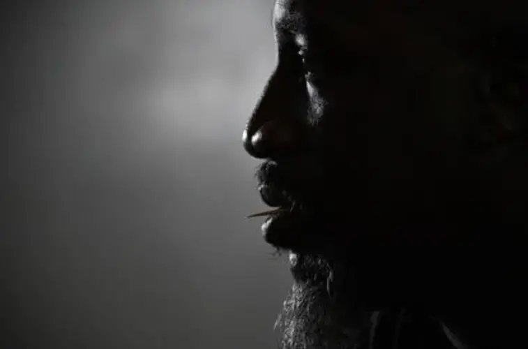Craig Ireland, 47, says there is not a day that passes that his massive child support debt isn’t on his mind. After working for years in the underground economy, he says he is trying to transition to a job on the payroll to make a clean break with his past life. But the agency will not release his driver’s license, and he missed the chance to land a $15-an-hour job at a moving company. Image by Lloyd Fox / Baltimore Sun. United States, undated.