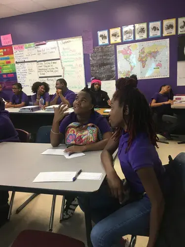Student discuss the different filmmaking techniques used in the 'Circus Without Borders' trailer. Image by Ashley Zhang. United States, 2018.