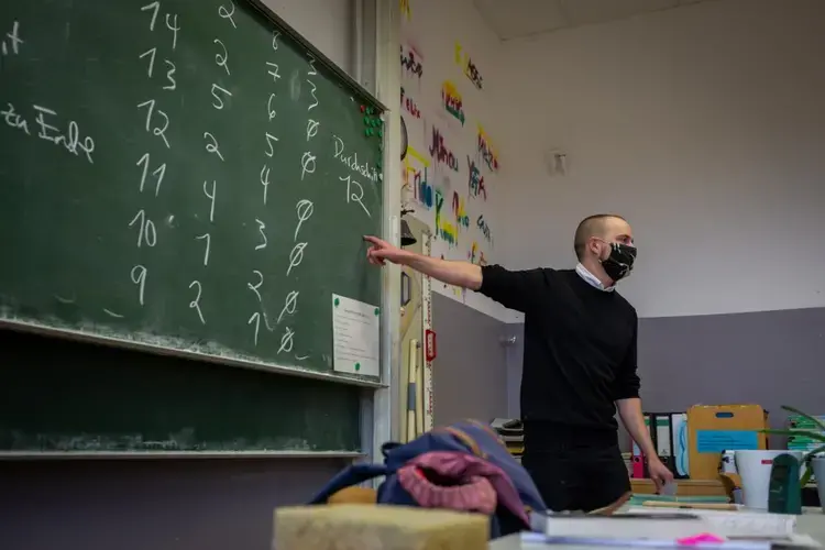 Ryan Plocher during a lesson at his high school in Berlin's Neukölln neighborhood in October, before a second lockdown closed German schools over the winter. Image by Ryan Delaney. Germany, 2020.