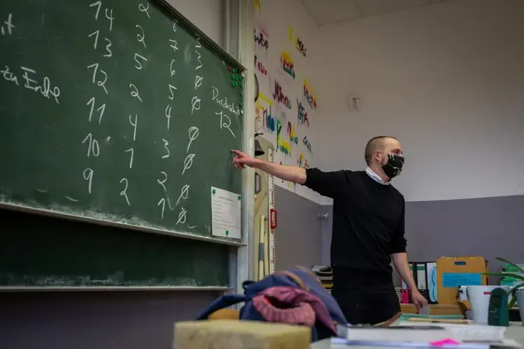 Ryan Plocher during a lesson at his high school in Berlin's Neukölln neighborhood in October, before a second lockdown closed German schools over the winter. Image by Ryan Delaney. Germany, 2020.