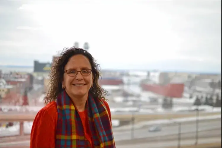 Julie Pierce, vice president of strategy and planning for Minnesota Power, at the utility's headquarters in downtown Duluth overlooking Lake Superior. Image by Walker Orenstein / MinnPost. United States, undated.
