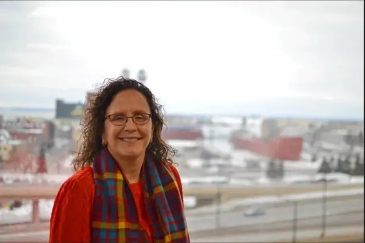 Julie Pierce, vice president of strategy and planning for Minnesota Power, at the utility's headquarters in downtown Duluth overlooking Lake Superior.  Image by Walker Orenstein / MinnPost. United States, undated.