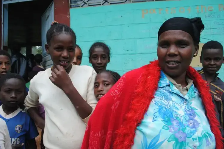 Tezerash Tesfa, 12, a student, and her mother Bekelech Balecha, 45. Image by Amy Yee. Ethiopia, 2016.