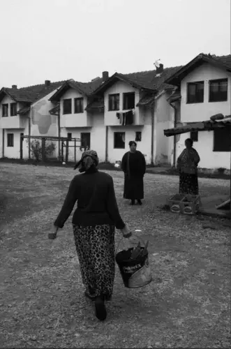 Halida Dudić and her neighbors in Oskova refugee camp, Živinice. Image by Jošt Franko. Bosnia and Herzegovina, 2019.