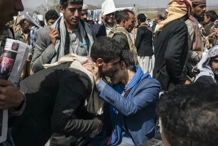 Supporters of the Houthis at the funeral for Saleh al-Samad. Image by Alex Potter. Yemen, 2018.