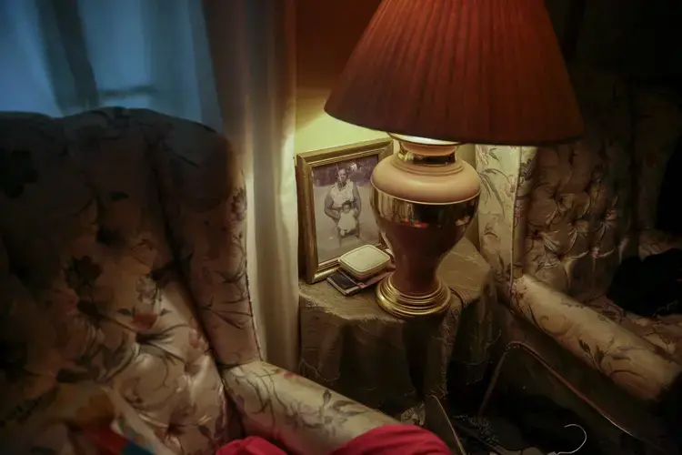 A pair of chairs belonging to Nellie 'Pollye Ann' Mae and Benjamin Tolbert, who both died days apart due to COVID-19, sit in their bedroom on Saturday, April 18, 2020, in Dawson, Ga. Image by Brynn Anderson / AP Photo. United States, 2020.