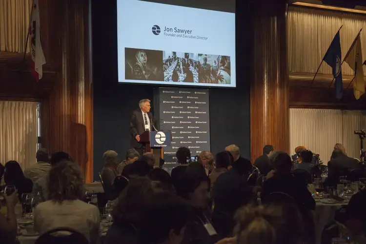Jon Sawyer welcomes journalists, news-media and education partners to the Pulitzer Center Gender Lens Conference Dinner Program at the National Press Club. Image by Jin Ding. United States, 2017. 