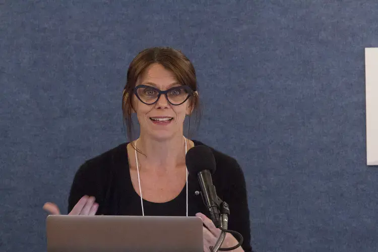 Jennifer Beard explains her study on HIV rates amongst sex workers and their boyfriends in Ghana, at the Pulitzer Center Gender Lens Conference. Image by Jin Ding. United States, 2017.