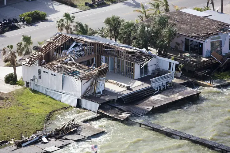 In Key Allegro, a coastal town where Harvey made landfall, the devastation was made worse by the fact that, prior to February, 2016, the lack of a designated flood zone allowed for homes to be constructed as close to the water as owners desired. Alex MacLean. United States, 2017.