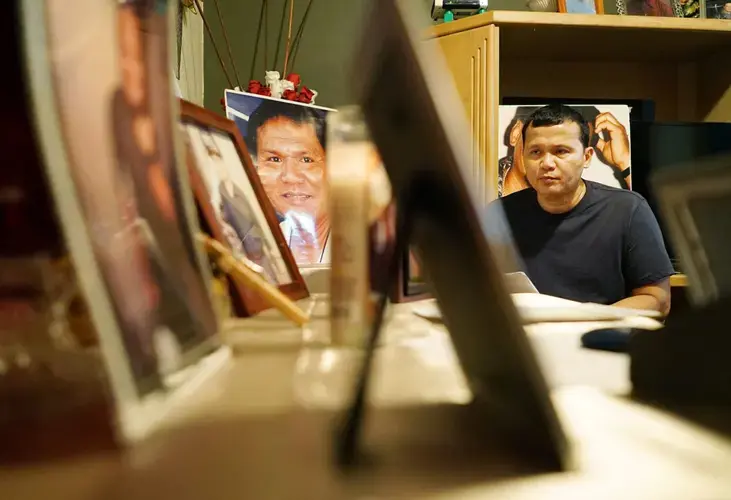 Roy Quintanilla during rosary held for his younger brother who died last year and another elder brother who passed away. Image by Cory Lum. Guam, 2017.