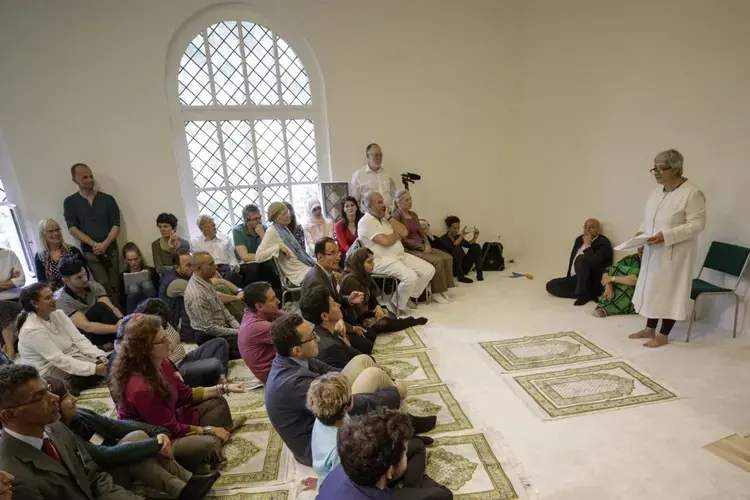 In the Ibn Rushd-Goethe mosque, women and men pray and preach equal rights. Image by Carsten Koall/EPA. Germany, 2017. 