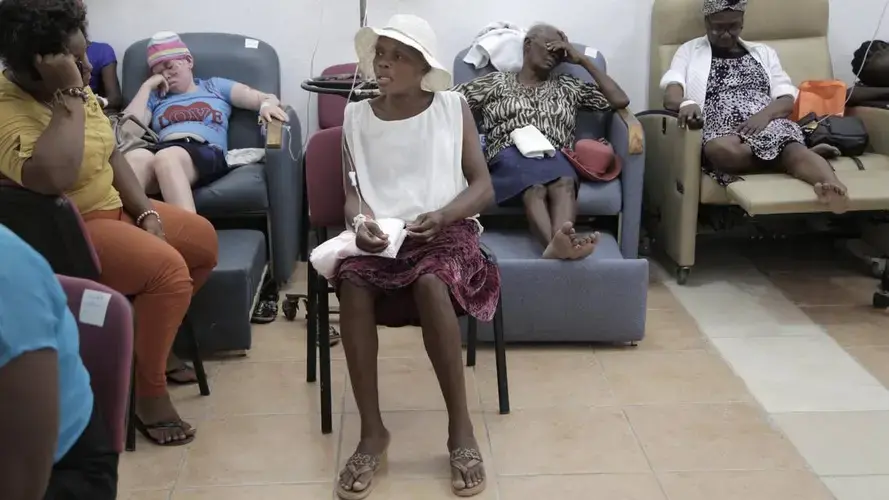 After several doctors told her that her cervical cancer was too far advanced for surgery, Guerda Janvier, 46, is hopeful that she can finally be treated for the disease. Image by José A. Iglesias. Haiti, 2018.
