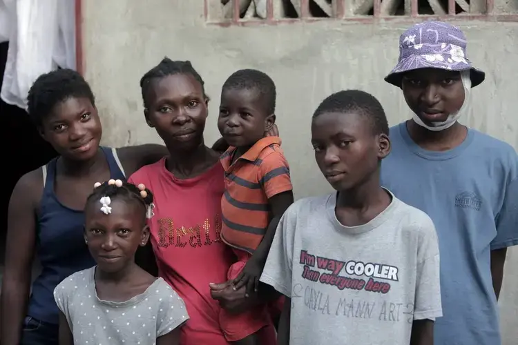 Two teenage boys in Haiti have advanced forms of cancers with high survival rates. One of them has treatment in Miami and the other is struggling to get treatment in a broken healthcare system in Haiti. Image by José A. Iglesias. Haiti, 2019.