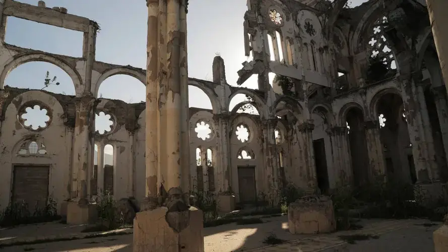 Rebuilding the Notre-Dame Cathedral in Port-au-Prince would cost an estimated $50 million. It remains in ruins 10 years after the earthquake. Image by Jose A. Iglesias. Haiti, 2019.
