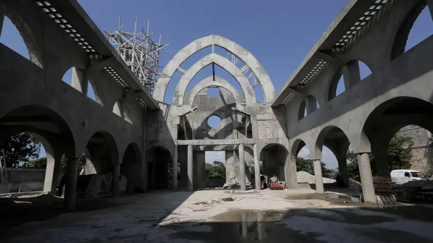 St. Gérard Catholic Church, in the historic Carrefour-Feuilles neighborhood of Port-au-Prince, rises, from the spot where the old church stood before collapsing during Haiti’s Jan. 12, 2010, earthquake. Image by Jose A. Iglesias. Haiti, 2020.