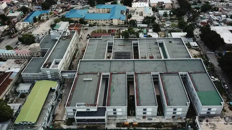 Aerial view of the new Hospital of the State University of Haiti in Port-au-Prince. Financed by France, the United States and the Haitian government, the hospital was promised after Haiti’s Jan. 12, 2010, earthquake, but has not yet opened. Image by Jean Marc Hervé Abélard / The Miami Herald. Haiti, 2019.