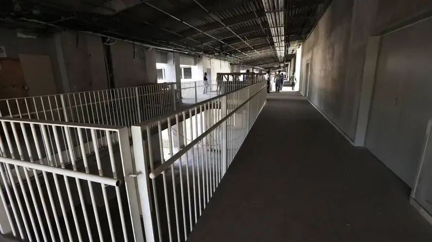 A view of a second floor hallway of the sprawling new hospital campus in Port-au-Prince. The hospital has yet to open. Image by Jose A. Iglesias. Haiti, 2019.