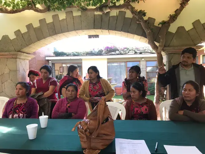 Family members from the Foundation for Justice and the Democratic Rule of Law gather on Dec. 3, 2018, at the Mexican consulate in Quetzaltenango, Guatemala for a yearly update on the ongoing investigation of their missing loved ones. Image courtesy of La Fundación Para La Justicia y El Estado Democrático de Derecho. Guatemala, 2018.