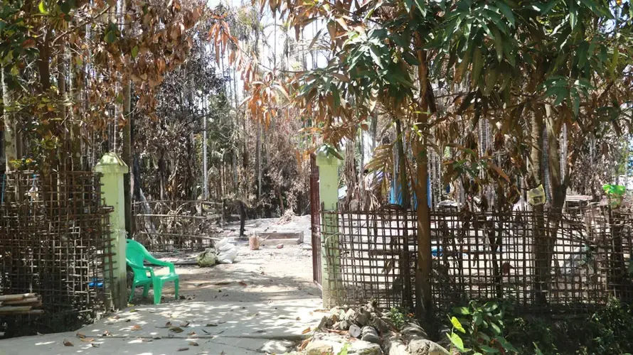 The remains of a burned home in Hpa Yar Paung village in Kyauktaw township, Rakhine State, after overnight violence on Sept. 3. Villagers say they are more concerned about the military than the coronavirus. Myanmar, 2020.